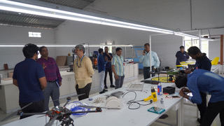 Team of dignitaries from KCT inspect the drone manufacturing